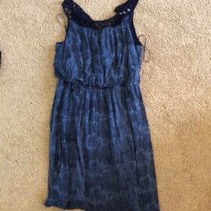 A Beautiful navy blue dress with button on back